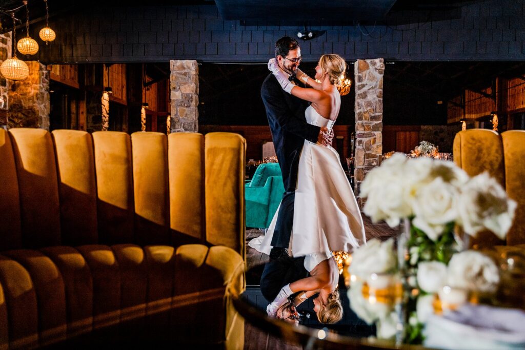 bride and groom first dance at Arkansas stone chapel wedding venue