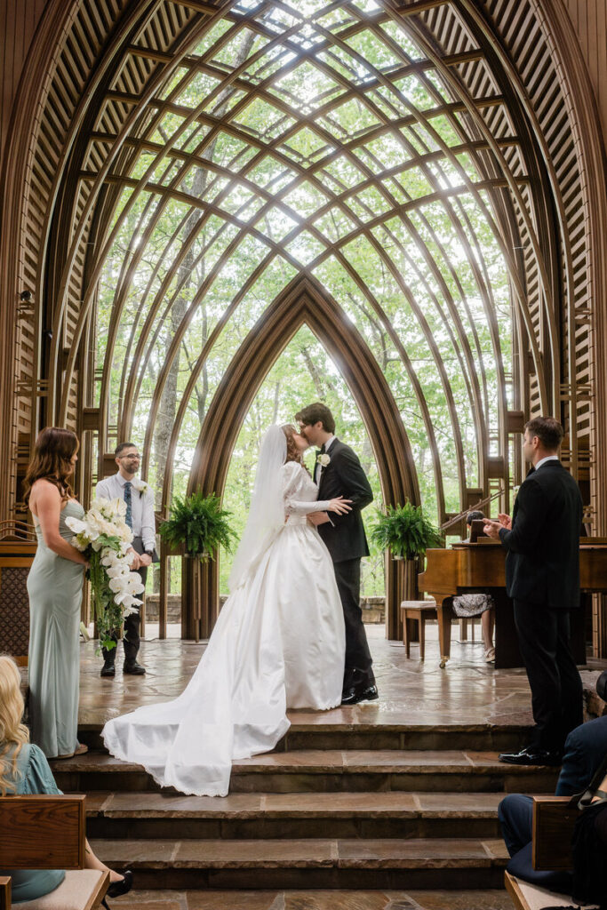 Bride and groom kiss at Mildred B Cooper Chapel wedding ceremony