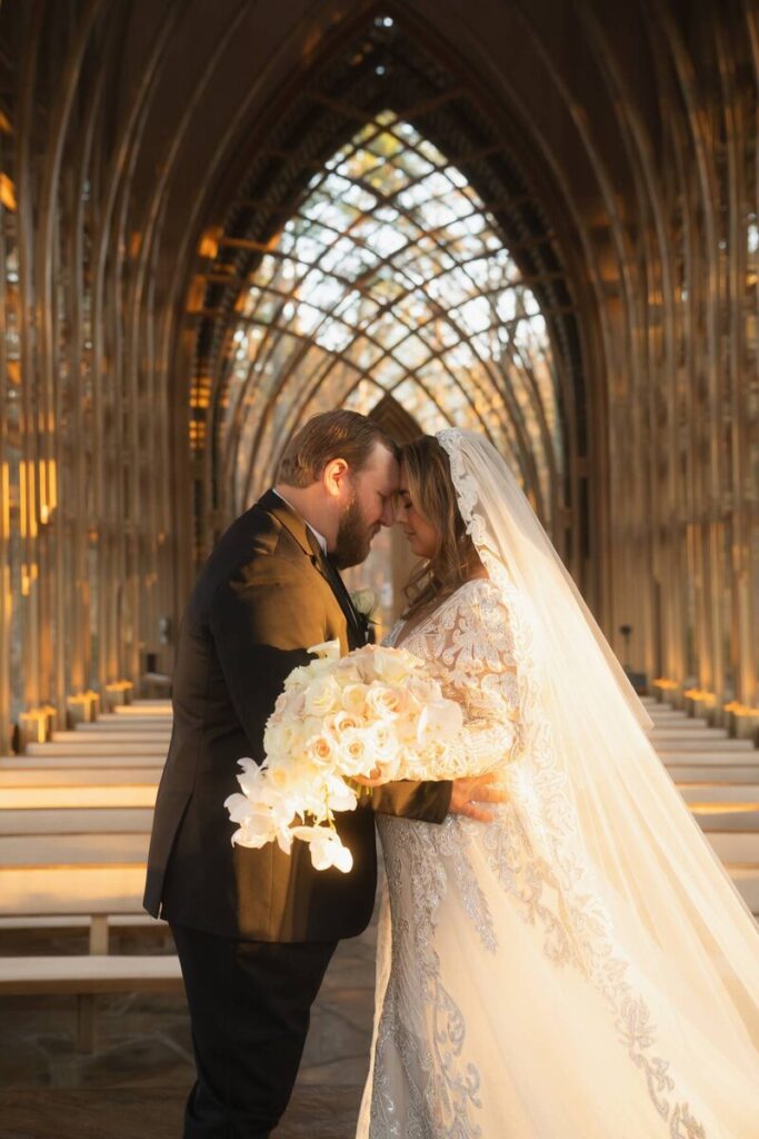 Bride and groom have a private moment before their Mildred B Cooper Chapel wedding.