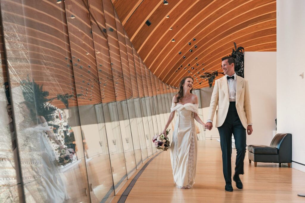 Newlyweds walk through Crystal Bridges Museum of American Art